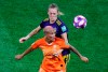 Netherlands' Shanice Van De Sanden, left, challenges for the ball with Sweden's Magdalena Eriksson during the Women's World Cup semifinal soccer match between the Netherlands and Sweden, at the Stade de Lyon outside Lyon, France, Wednesday, July 3, 2019. (AP Photo/Francois Mori)