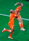 Netherlands' Jackie Groenen, right, celebrates with her teammate Shanice Van De Sanden after scoring her side's opening goal during the Women's World Cup semifinal soccer match between the Netherlands and Sweden, at the Stade de Lyon outside Lyon, France, Wednesday, July 3, 2019. (AP Photo/Francois Mori)