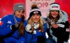 United States' Mikaela Shiffrin, center, shows her gold medal of the women's super-G, flanked by silver medallist Italy's Sofia Goggia, left, and bronze medal's Switzerland's Corinne Suter, at the alpine ski World Championships in Are, Sweden, Tuesday, Feb. 5, 2019. (AP Photo/Gabriele Facciotti)