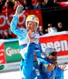 FILE - In this March 15, 2012 file photo, Sweden's Anja Paerson is carried on her teammates' shoulders after completing an alpine ski in the women's World Cup super-G in Schladming, Austria. Flash back to a dozen years ago and Anja Paerson was at the top of the skiing world with her five-medal performance on home snow at the 2007 worlds in Are. Back in Are for this year‚Äôs worlds to take part in a ‚Äúlegends‚Äù race, Paerson is making headlines for a different reason, as a spokeswoman for gay rights. Paerson and her wife have three children. (AP Photo/Armando Trovati, File)