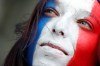 A French soccer fan waits for the start of the Group A soccer match between France and South Korea on the occasion of the Women's World Cup at the Parc des Princes in Paris, Friday, June 7, 2019. (AP Photo/Francisco Seco)