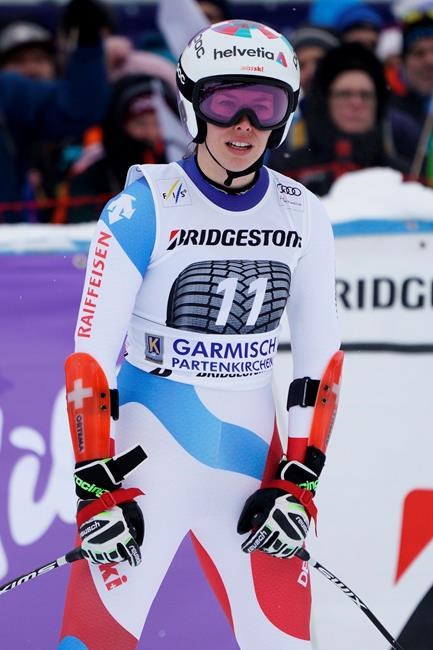 Switzerland's Michelle Gisin arrives at the finish area of an alpine ski, women's World Cup super G, in Garmisch Partenkirchen, Germany, Saturday Jan. 26, 2019. (AP Photo/Giovanni Auletta)