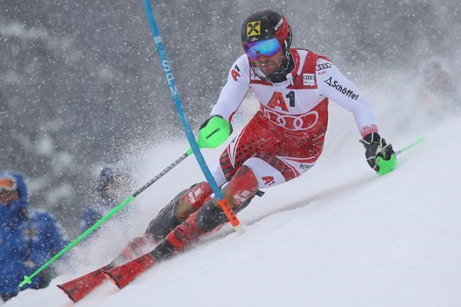 Austria's Marcel Hirscher competes during an alpine ski, men's World Cup slalom, in Kitzbuehel, Austria, Saturday Jan. 26, 2019. (AP Photo/Alessandro Trovati)