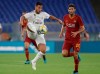 Real forward Eden Hazard, left, and Roma defender Federico Fazio vie for the ball during a friendly soccer match between Roma and Real Madrid, at the Olympic stadium in Rome, Sunday, Aug. 11, 2019. (AP Photo/Gregorio Borgia)