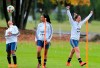 Argentine women's soccer team player Aldana Cometti, right, celebrates as Yael Oviedo stands at center during training ahead of the FIFA Women's World Cup France 2019 tournament, at the Argentina Football Association in Ezeiza on the outskirts of Buenos Aires, Argentina, Monday, May 20, 2019. Argentina players that took the team to its first women’s World Cup in 12 years organized a strike in the end of 2017 due to the lack of support they endured, kicking off a movement against sexism that forced the country’s soccer body to change and turn them into professionals. (AP Photo)