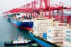 In this Wednesday, May 8, 2019, photo, a barge pushes a container ship to the dockyard in Qingdao in eastern China's Shandong province. President Donald Trump's latest tariff hikes on Chinese goods took effect Friday and Beijing said it would retaliate, escalating tensions in fight over China's technology ambitions and other trade strains. (Chinatopix via AP)