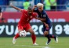 Bahrain's midfielder Ali Al Safi, left, controls the ball against Thailand's midfielder Chanathip Songkrasin, right, during the AFC Asian Cup group A soccer match between Bahrain and Thailand at Al Maktoum Stadium in Dubai, United Arab Emirates, Thursday, Jan. 10, 2019. (AP Photo/Hassan Ammar)