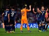 Japan players celebrate at the end of the AFC Asian Cup semifinal soccer match between Iran and Japan at Hazza Bin Zayed Stadium in Al Ain, United Arab Emirates, Monday, Jan. 28, 2015. Japan beat Iran 2-0. (AP Photo/Hassan Ammar)