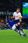 Everton's Kurt Zouma, left, and Tottenham's Harry Kane vie for the ball during the English Premier League soccer match between Everton and Tottenham at Goodison Park Stadium, in Liverpool, England, Sunday, Dec. 23, 2018. (AP Photo/Jon Super)