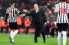 Newcastle coach Rafael Benitez, right, greets Newcastle's Mohamed Diame at the end of the English Premier League soccer match between Liverpool and Newcastle at Anfield Stadium, in Liverpool, England, Wednesday, Dec. 26, 2018. (AP Photo/Jon Super)