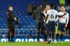 Tottenham coach Mauricio Pochettino, left celebrates with his players at the end of the English Premier League soccer match between Everton and Tottenham at Goodison Park Stadium, in Liverpool, England, Sunday, Dec. 23, 2018. (AP Photo/Jon Super)
