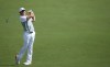 Rory McIlroy of Northern Ireland plays a shot on the first hole during the final round of the DP World Tour Championship golf tournament in Dubai, United Arab Emirates, Sunday, Nov. 22, 2015. (AP Photo/Kamran Jebreili)