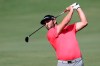 Jon Rahm of Spain follows his ball on the 2nd hole during the final round of the DP World Tour Championship golf tournament in Dubai, United Arab Emirates, Sunday, Nov. 24, 2019. (AP Photo/Kamran Jebreili)