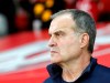 FILE - In this Oct. 29, 2017 file photo, Marcelo Bielsa looks on during their French League one soccer match against Marseille at the Lille Metropole stadium, in Villeneuve d'Ascq, northern France. English second-tier club Leeds has been accused by a rival of having an employee spy on its training session ahead of a league match. Derby County says police were called to its training center following reports of a man 