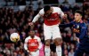 Arsenal's Alexandre Lacazette heads the ball to score his side's second goal, during the Europa League semifinal first leg soccer match between Arsenal and Valencia at the Emirates stadium in London, Thursday, May 2, 2019. (AP Photo/Kirsty Wigglesworth)