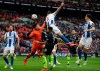 Brighton's Shane Duffy makes an attempt to score during the English FA Cup semifinal soccer match between Manchester City and Brighton & Hove Albion at Wembley Stadium in London, Saturday, April 6, 2019. (AP Photo/Matt Dunham)