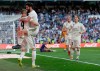Real Madrid's Isco second from left, celebrates with his teammate Karim Benzema after scoring during a Spanish La Liga soccer match between Real Madrid and Celta at the Santiago Bernabeu stadium in Madrid, Spain, Saturday, March 16, 2019.(AP Photo/Paul White)