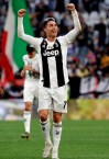 Juventus' Cristiano Ronaldo celebrates at the end of a Serie A soccer match between Juventus and AC Fiorentina, at the Allianz stadium in Turin, Italy, Saturday, April 20, 2019. Juventus clinched a record-extending eighth successive Serie A title, with five matches to spare, after it defeated Fiorentina 2-1. (AP Photo/Luca Bruno)