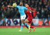 Manchester City's Raheem Sterling, left, challenges for the ball with Liverpool's Dejan Lovren during the English Premier League soccer match between Liverpool and Manchester City at Anfield stadium in Liverpool, England, Sunday, Nov. 10, 2019. (AP Photo/Jon Super)