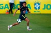 Brazil's soccer player Neymar runs for the ball during a practice session at the Granja Comary training center ahead of the Copa America tournament, in Teresopolis, Brazil, Tuesday, May 28, 2019. (AP Photo/Leo Correa)