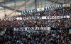 Marseille supporters display banners reading 