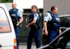 Armed police patrol outside a mosque in central Christchurch, New Zealand, Friday, March 15, 2019. A witness says many people have been killed in a mass shooting at a mosque in the New Zealand city of Christchurch. (AP Photo/Mark Baker)