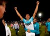 Racing Club's defender Leonardo Sigali, teammates and staff celebrate clinching the Argentine Superliga Championship title, after a match against Tigre, in Victoria on the outskirts of Buenos Aires, Argentina, Sunday, March 31, 2019. Racing Club tied with Tigre but won the title on points. (AP Photo/Mariano Blanc)