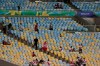 Fans sit on almost empty stands prior to a Copa America Group A soccer match between Bolivia and Peru at the Maracana stadium in Rio de Janeiro, Brazil, Tuesday, June 18, 2019. (AP Photo/Leo Correa)