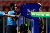 Referee Alexis Herrera reviews a play on the VAR stand during a Copa America Group B soccer match between Colombia and Qatar at Morumbi stadium in Sao Paulo, Brazil, Wednesday, June 19, 2019. (AP Photo/Victor R. Caivano)