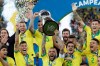 Brazil's Dani Alves lifts up the trophy after winning the final soccer match of the Copa America against Peru at the Maracana stadium in Rio de Janeiro, Brazil, Sunday, July 7, 2019. Brazil won the match 3-1. (AP Photo/Andre Penner)