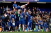Chelsea's Gary Cahill, top center, is cheered by teammates at the end of the English Premier League soccer match between Chelsea and Watford at Stamford Bridge stadium in London, Sunday, May 5, 2019. (AP Photo/Matt Dunham)