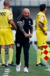 Jorge Sampaoli, coach of Santos, celebrates after the first goal during a Sao Paulo Soccer league championship match against Ferroviaria in Santos, Brazil, Saturday, Jan. 19, 2019. It's the first match of the coach Sampaoli, of Argentina, as head of the legendary Santos Soccer team. (AP Photo/Nelson Antoine)