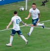 Argentina's Lautaro Martinez, right, celebrates scoring his side's opening goal with teammate Lionel Messi during a Copa America quarterfinal soccer match against Venezuela at the Maracana stadium in Rio de Janeiro, Brazil, Friday, June 28, 2019. (AP Photo/Silvia Izquierdo)