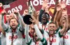 Lokomotiv Moscow's team celebrate their victory against Zenit St. Petersburg's after the Russian Super Cup soccer match in Moscow, Russia, Saturday, July 6, 2019. Lokomotiv won 3-2. (AP Photo/Pavel Golovkin)