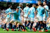 Manchester City's Phill Foden, left, celebrates his goal against Tottenham during the English Premier League soccer match between Manchester City and Tottenham Hotspur at Etihad stadium in Manchester, England, Saturday, April 20, 2019. (AP Photo/Rui Vieira)