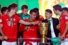 Bayern players with their coach Niko Kovac celebrate with the trophy after winning the German soccer cup, DFB Pokal, final match between RB Leipzig and Bayern Munich at the Olympic stadium in Berlin, Germany, Saturday, May 25, 2019. (AP Photo/Matthias Schrader)