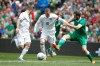 England's Wayne Rooney, centre, is tackled by Republic of Ireland's Marc Wilson, right, during their international soccer friendly match at the Aviva stadium, Dublin, Ireland, Sunday, June 7, 2015. (AP Photo/Peter Morrison)