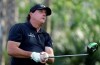 Phil Mickelson watches his tee shot on the 13th hole during the first round of The Players Championship golf tournament Thursday, March 14, 2019, in Ponte Vedra Beach, Fla. (AP Photo/Lynne Sladky)