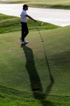 Abraham Ancer casts a shadow as he waits to hit on the seventh green during the second round of The Players Championship golf tournament Friday, March 15, 2019, in Ponte Vedra Beach, Fla. (AP Photo/Lynne Sladky)