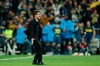 Guillermo Barros Schelotto, coach of Argentina's Boca Juniors, celebrates his side's opening goal, scored by Dario Benedetto, against Argentina's River Plate during the Copa Libertadores final soccer match at the Santiago Bernabeu stadium in Madrid, Spain, Sunday, Dec. 9, 2018. (AP Photo/Manu Fernandez)