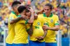 Teammates congratulate Brazil's Everton, with the ball under his jersey, after he scored his side's third goal against Peru during a Copa America Group A soccer match at the Arena Corinthians in Sao Paulo, Brazil, Saturday, June 22, 2019. (AP Photo/Victor R. Caivano)