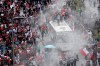 Anti-government demonstrators march in Santiago, Chile, Friday, Oct. 25, 2019. A new round of clashes broke out Friday as demonstrators returned to the streets, dissatisfied with economic concessions announced by the government in a bid to curb a week of violence that began with a protest over a hike in subway fares. (AP Photo/Esteban Felix)