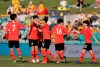 South Korea's Soyun Ji, center, is congratulated by teammates after scoring their 5th goal against Argentina during their Cup of Nations soccer game in Sydney, Thursday, Feb. 28, 2019. (AP Photo/Rick Rycroft)