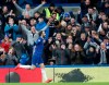 Chelsea's Gonzalo Higuain celebrates after scoring his side's opening goal during the English Premier League soccer match between Chelsea and Huddersfield Town at Stamford Bridge stadium in London, Britain, Saturday, Feb. 2, 2019. (AP Photo/ Alastair Grant)
