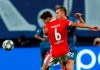 Benfica's Ruben Dias, left, fights for the ball with Zenit's Artem Dzyuba during the Champions League group G soccer match between Zenit St.Petersburg and Benfica at the Saint Petersburg stadium in St.Petersburg, Russia, Wednesday, Oct. 2, 2019. (AP Photo/Mike Kireev)