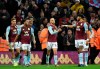 Aston Villa players celebrate after Aston Villa's Conor Hourihane, centre, scored his side's opening goal during the English Premier League soccer match between Aston Villa and Newcastle United at Villa Park in Birmingham, England, Monday, Nov. 25, 2019. (AP Photo/Rui Vieira)