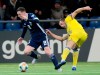 Scotland's Callum McGregor, left, and Kazakhstan's Roman Murtazayev challenge for the ball during the Euro 2020 group I qualifying soccer match between Kazakhstan and the Scotland at Astana Arena stadium in Astana, Kazakhstan, Thursday, March 21, 2019. (AP Photo/Alexei Filippov)