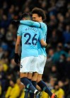 Manchester City's Leroy Sane, right, celebrates with teammate Riyad Mahrez after scoring his side's second goal during the English Premier League soccer match between Manchester City and Cardiff City at Etihad stadium in Manchester, England, Wednesday, April 3, 2019. (AP Photo/Rui Vieira)