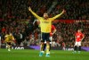 Arsenal's Pierre-Emerick Aubameyang celebrates after scoring the opening goal during the English Premier League soccer match between Manchester United and Arsenal at Old Trafford in Manchester, England, Monday, Sept. 30, 2019. (AP Photo/Dave Thompson)
