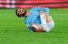 Manchester City's Bernardo Silva lies on the pitch in pain during the English Premier League soccer match between Leicester City and Manchester City at the King Power Stadium in Leicester, England, Wednesday, Dec. 26, 2018. (AP Photo/Rui Vieira)